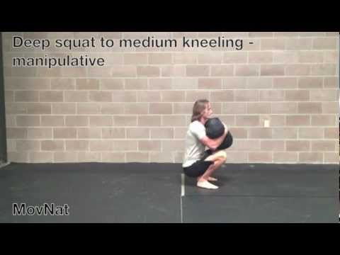 Deep squat to medium kneeling - manipulative