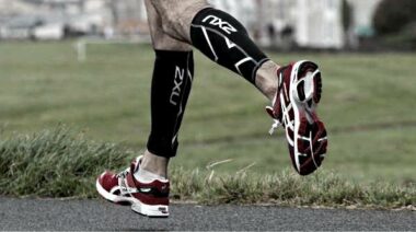 Sponsored runner wearing 2xu calf sleeves