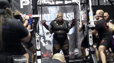 Powerlifter Tamara Walcott finishes a back squat rep.