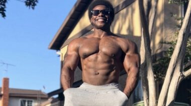 Bodybuilder Breon Ansley glows and smiles during April 2022