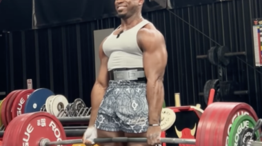 Russell Orhii smiles while PR deadlifting 760 pounds.