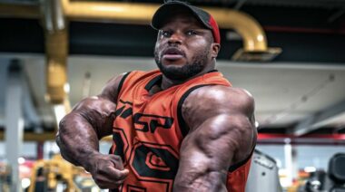 Shaun Clarida shows off his immense arms in mid-April 2022