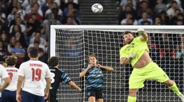 Tom Stoltman defends a pass during 2022 Soccer Aid