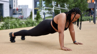 person doing push-ups outdoors