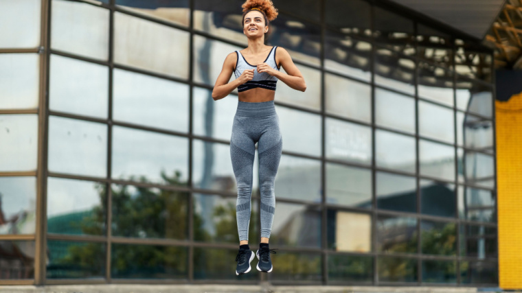 person outdoors jumping up