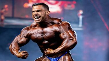 Derek Lunsford 2022 Mr. Olympia Reflection:Arm-Posing