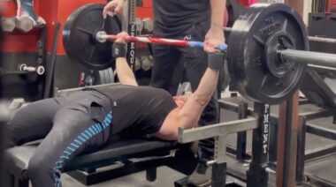 Powerlifter Jen Thompson performs bench press