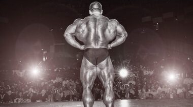 Bodybuilder Dorian Yates posing on stage in front of audience