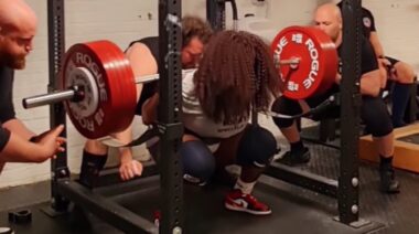 Powerlifter Sonita Muluh performing heavy barbell squat