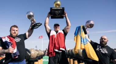 2023 World's Strongest Man competitors holding trophies