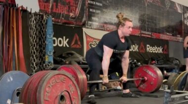 Powerlifter Kristy Hawkins performing sumo deadlift