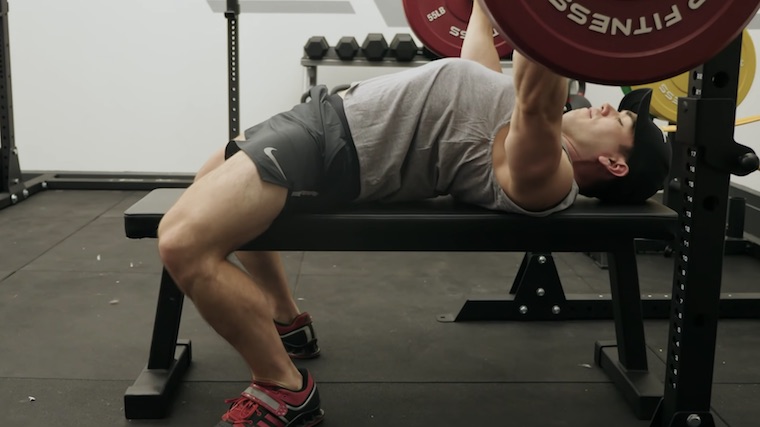 Powerlifter Taylor Atwood preparing to bench press