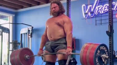 Strongman Martins Licis performing heavy deadlift in gym