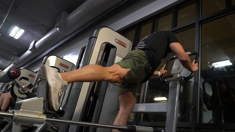 Bodybuilder Chris Elkins performing glute machine exercise