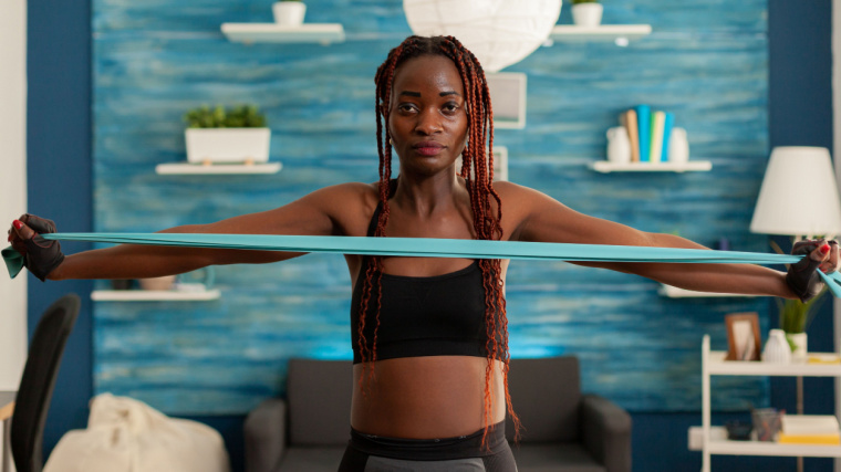 Person using exercise band at home