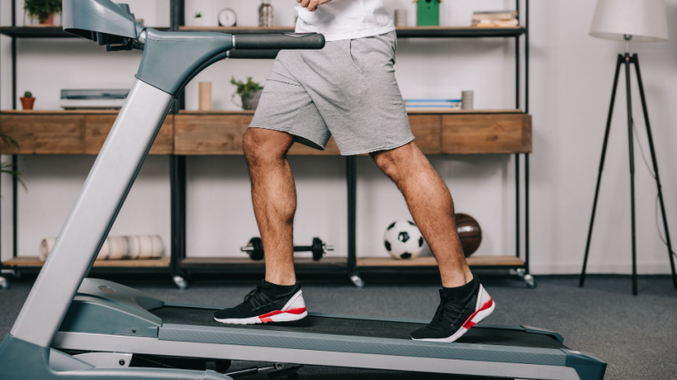 Person walking on treadmill at home