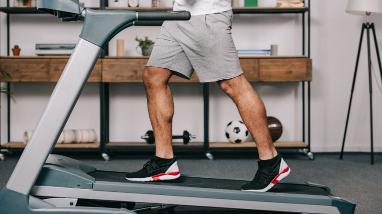 Person on treadmill in home gym